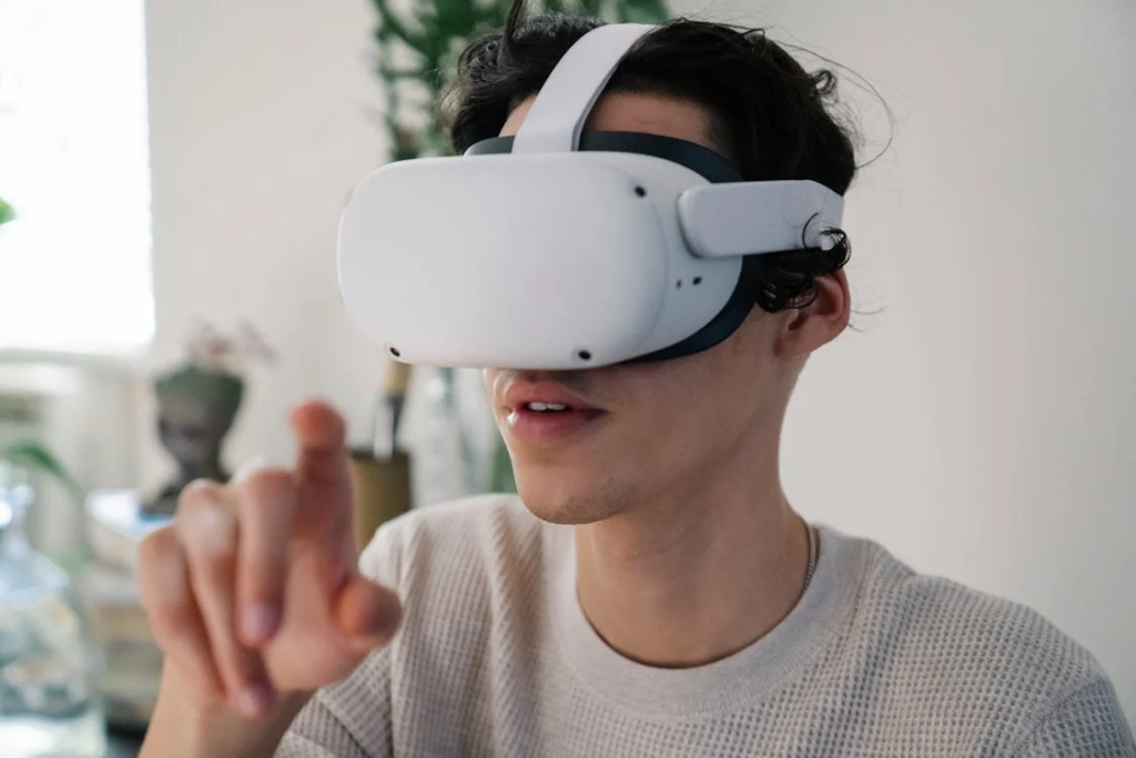a guy wearing a VR goggles
