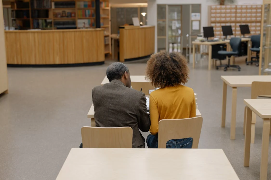 a professor helping a student